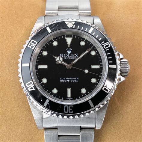 rolex 14060 swiss only dial.